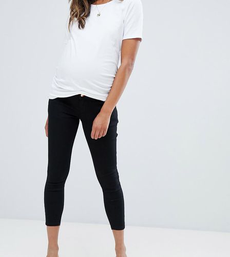 ASOS DESIGN Maternity Petite - Ridley - Jeans skinny a vita alta pulito con fascia per il pancione - ASOS Maternity - Modalova