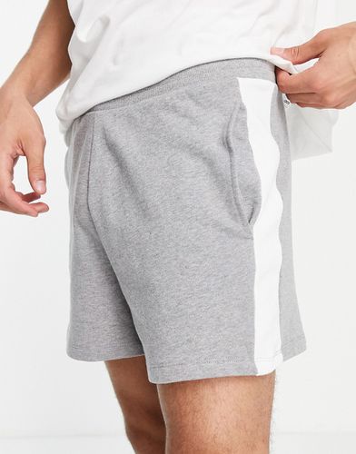 Pantaloncini oversize in jersey mélange con riga laterale - ASOS DESIGN - Modalova