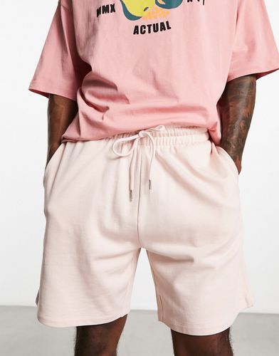 Pantaloncini oversize lunghezza media in jersey - ASOS DESIGN - Modalova