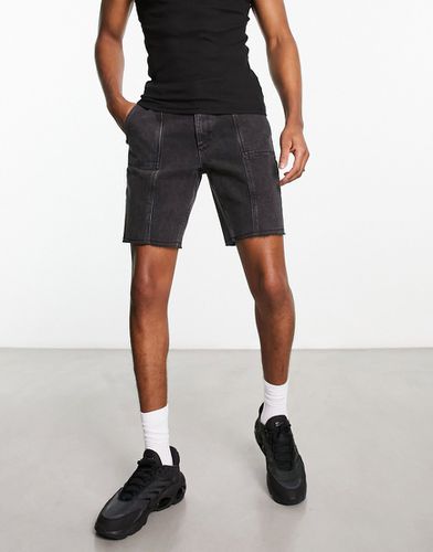 Pantaloncini di jeans rigidi classici taglio regular nero slavato con cuciture a vista - ASOS DESIGN - Modalova