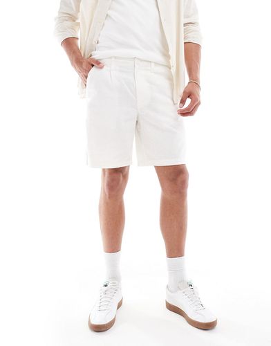 Pantaloncini in lino bianchi a pieghe - ASOS DESIGN - Modalova