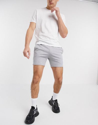 Pantaloncini skinny più corti in jersey mélange - ASOS DESIGN - Modalova