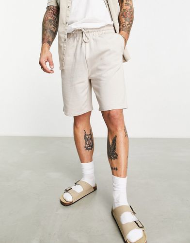 Pantaloncini slim in jersey grigio beige - ASOS DESIGN - Modalova