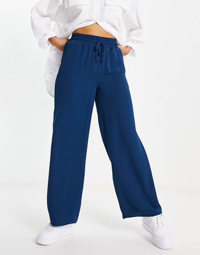 Pantaloni a fondo ampio navy - ASOS DESIGN - Modalova