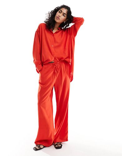 Pantaloni a fondo ampio rossi in misto lino - ASOS DESIGN - Modalova