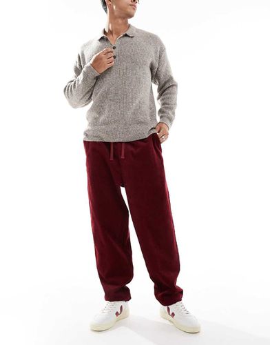 Pantaloni affusolati in velluto a coste bordeaux - ASOS DESIGN - Modalova