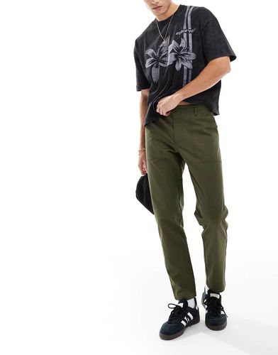 Pantaloni affusolati verdi - ASOS DESIGN - Modalova