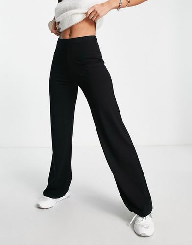 Pantaloni basic in jersey con fondo ampio neri - ASOS DESIGN - Modalova