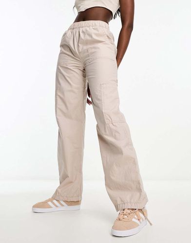 Pantaloni cargo minimal color pietra - ASOS DESIGN - Modalova