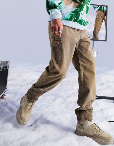 Pantaloni cargo stile skater in tela lavaggio acido - ASOS DESIGN - Modalova