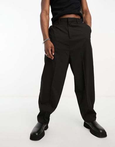 Pantaloni da abito neri a palloncino - ASOS DESIGN - Modalova