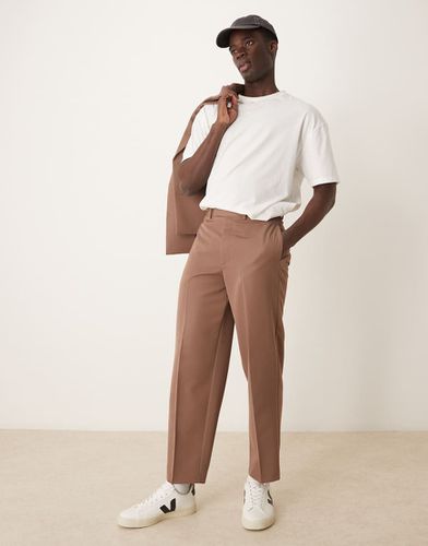 Pantaloni da abito oversize affusolati marroni - ASOS DESIGN - Modalova