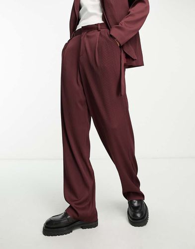 Pantaloni da abito a fondo ampio bordeaux plissé - ASOS DESIGN - Modalova