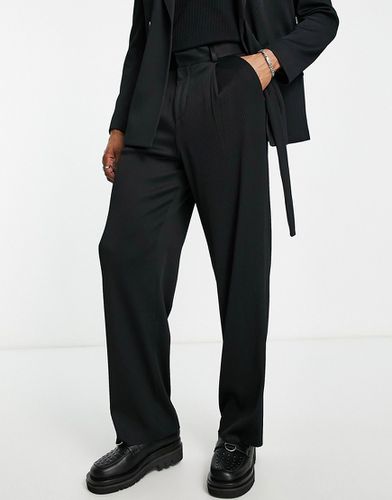 Pantaloni da abito con fondo ampio neri plissé - ASOS DESIGN - Modalova