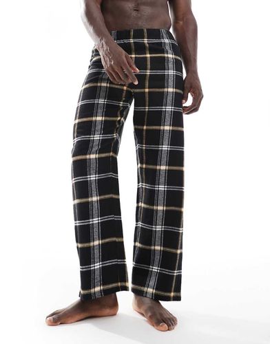 Pantaloni da casa neri a quadri - ASOS DESIGN - Modalova