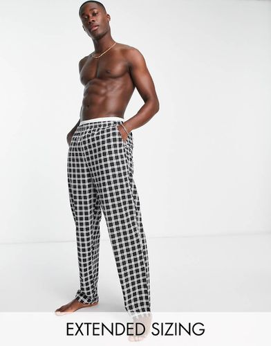 Pantaloni da casa neri e bianchi a quadri - ASOS DESIGN - Modalova