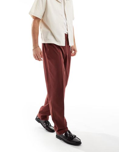 Pantaloni eleganti oversize affusolati color bordeaux - ASOS DESIGN - Modalova