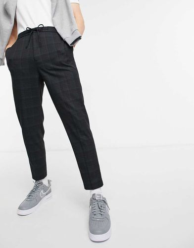 Pantaloni eleganti affusolati con coulisse e motivo con tratteggio incrociato - ASOS DESIGN - Modalova