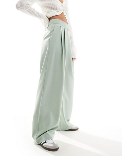 Pantaloni sartoriali a fondo ampio color menta con pieghe - ASOS DESIGN - Modalova