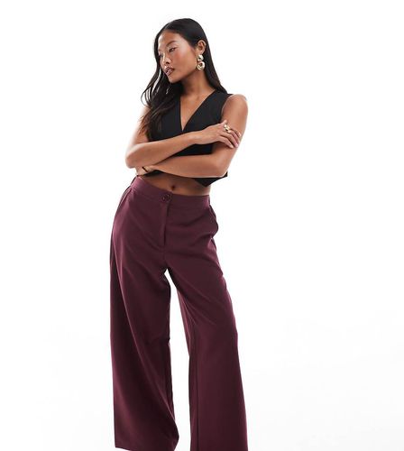 ASOS DESIGN Petite - Pantaloni sartoriali comodi a fondo ampio bordeaux - ASOS Petite - Modalova