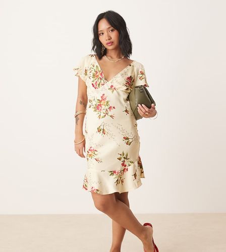 ASOS DESIGN Petite - Robe courte à manches évasées et imprimé fleurs - Asos Petite - Modalova