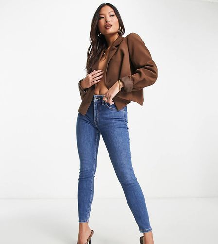 ASOS DESIGN Petite - Ultimate - Jeans skinny medio autentico - ASOS Petite - Modalova