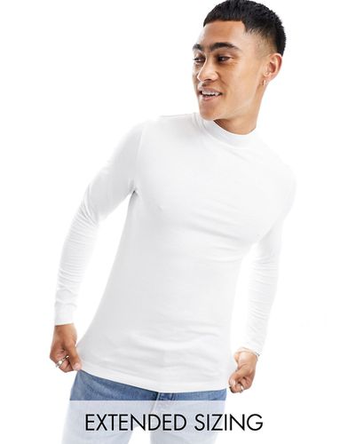 T-shirt attillata a maniche lunghe bianca con collo alto - ASOS DESIGN - Modalova