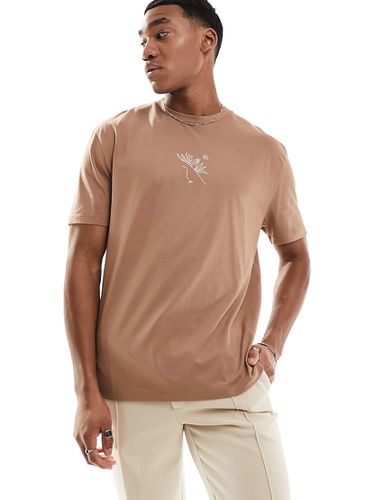 T-shirt comoda color cuoio con stampa astratta sul petto - ASOS DESIGN - Modalova