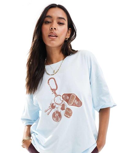 T-shirt oversize azzurro chiaro con grafica di portachiavi New York - ASOS DESIGN - Modalova