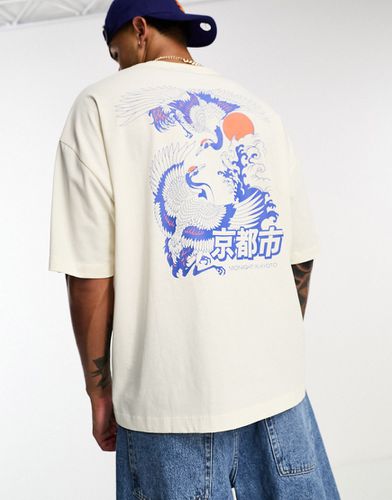 T-shirt oversize sporco con stampa di uccello sul retro - ASOS DESIGN - Modalova