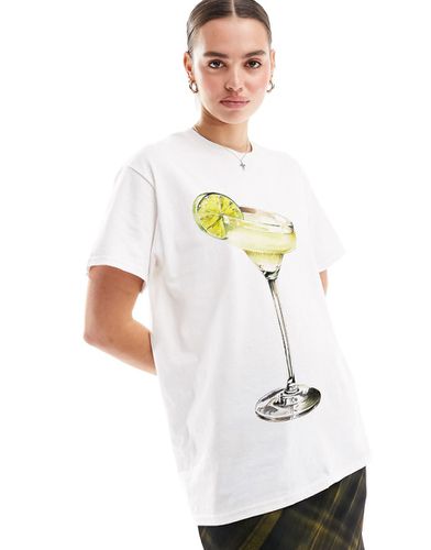 T-shirt oversize bianca con grafica con cocktail al lime - ASOS DESIGN - Modalova