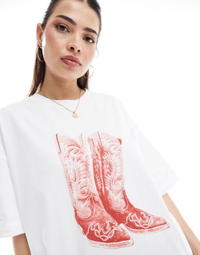 T-shirt oversize bianca con grafica di stivali da cowboy - ASOS DESIGN - Modalova