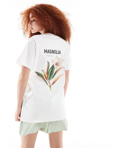 T-shirt oversize bianca con stampa di magnolia sul retro - ASOS DESIGN - Modalova