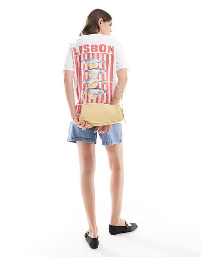 T-shirt oversize color avorio con grafica "Lisbon Holiday" - ASOS DESIGN - Modalova