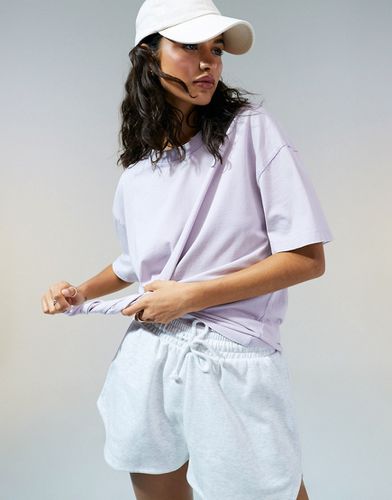 T-shirt oversize lilla slavato - ASOS DESIGN - Modalova