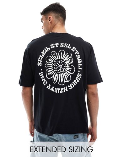 T-shirt oversize nera con stampa di fiori sul retro - ASOS DESIGN - Modalova