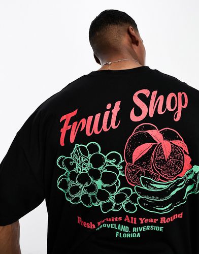 T-shirt oversize nera con stampa di frutta sulla schiena - ASOS DESIGN - Modalova