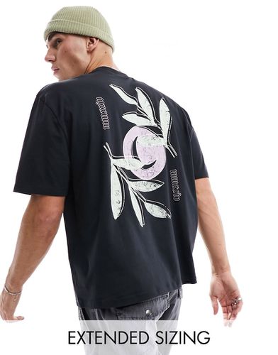 T-shirt oversize nera con stampa floreale sul retro - ASOS DESIGN - Modalova