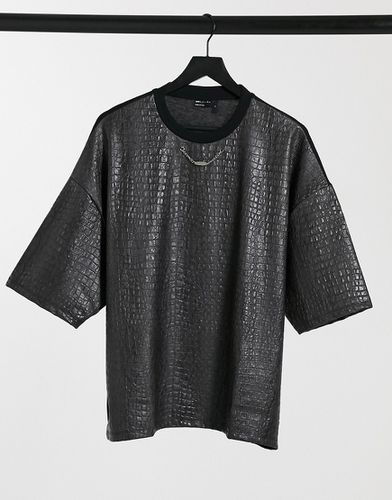 T-shirt oversize nera effetto coccodrillo in rilievo - ASOS DESIGN - Modalova