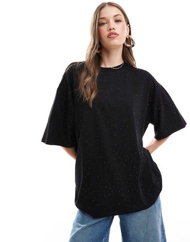 T-shirt oversize slavato con borchie - ASOS DESIGN - Modalova