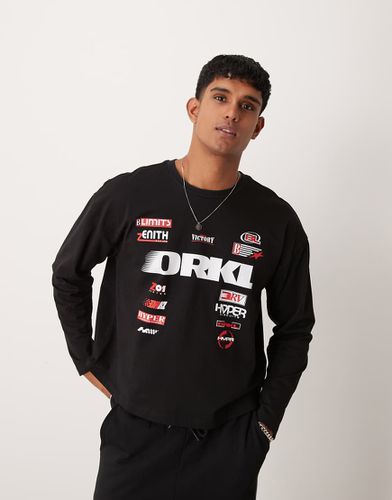 T-shirt oversize squadrata nera con grafica stile racing sul retro - ASOS DESIGN - Modalova