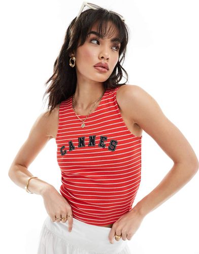 Top a canotta rosso a righe con grafica Cannes - ASOS DESIGN - Modalova