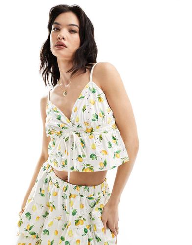 Top stile babydoll in pizzo con spalline sottili e stampa di limoni in coordinato - ASOS DESIGN - Modalova