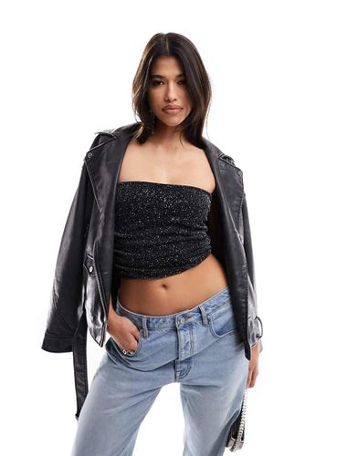 Top stile corsetto senza maniche in tessuto a rete glitterato - ASOS DESIGN - Modalova