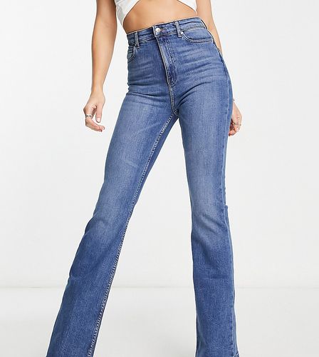 Tall - Jeans a zampa medio - ASOS DESIGN - Modalova