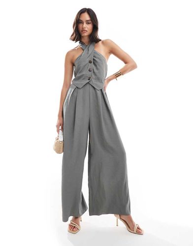 Tuta jumpsuit kaki con bottoni e incrocio sul collo - ASOS DESIGN - Modalova