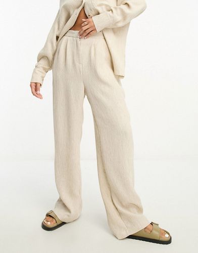 Pantaloni in misto lino color pietra testurizzato con fondo ampio - ASOS EDITION - Modalova