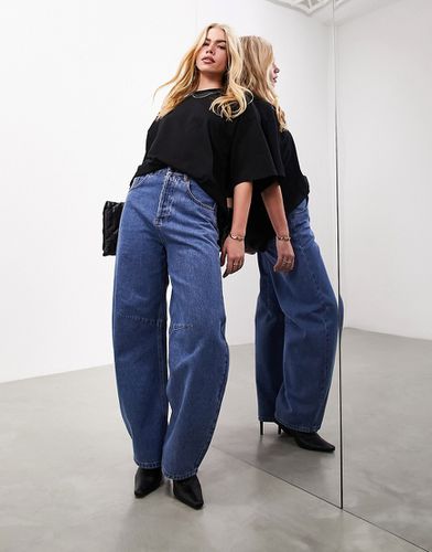 Sydney - Jeans a vita alta con gamba bombata color medio - ASOS EDITION - Modalova