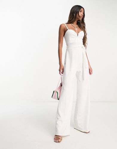 Tuta jumpsuit a fondo ampio bianca con scollo a V - AX Paris - Modalova