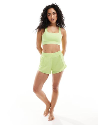 Padma - Pantaloncini lime con shorts incorporati - Born Living Yoga - Modalova